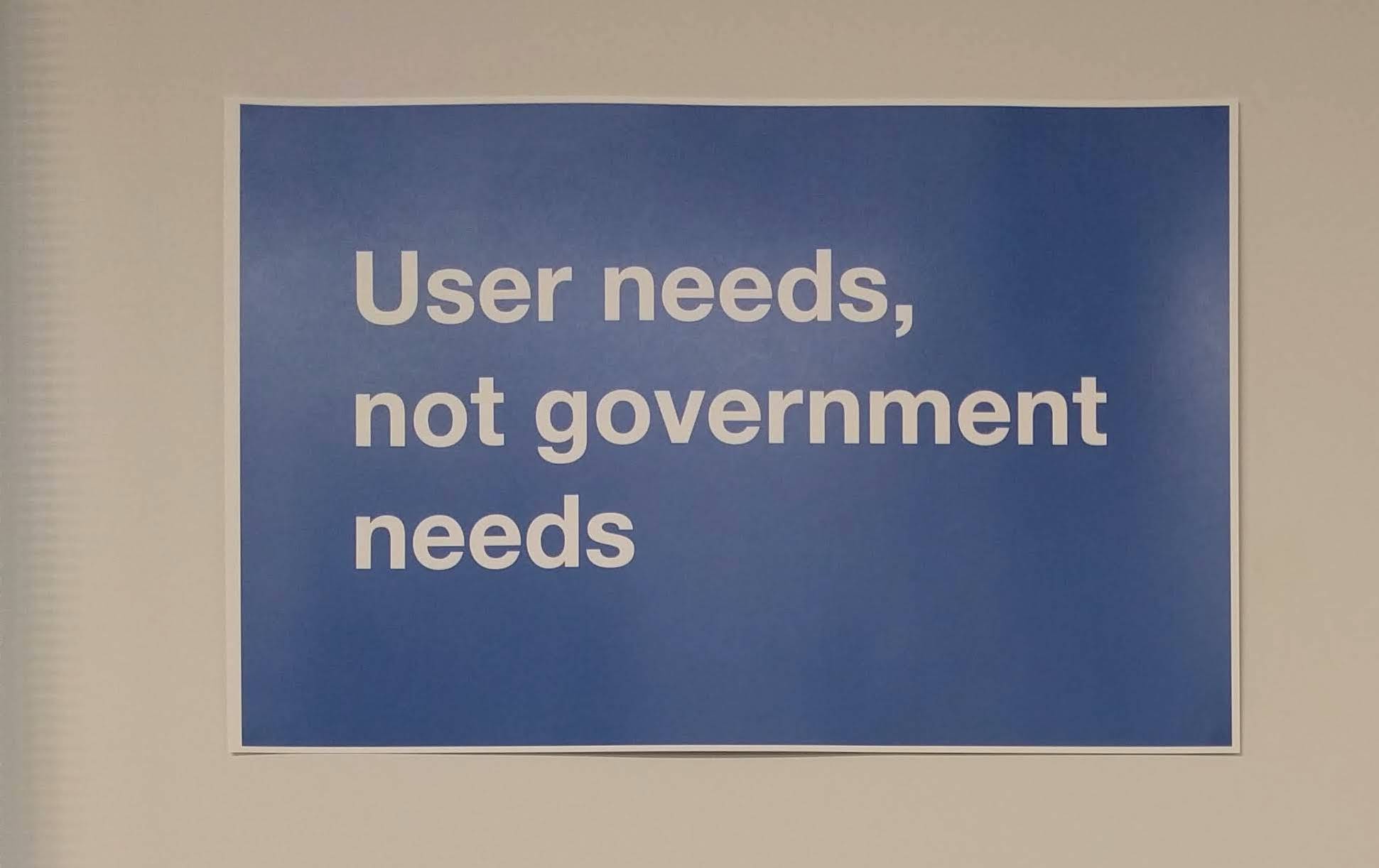 A poster with a blue background that says “User needs, not government needs”.