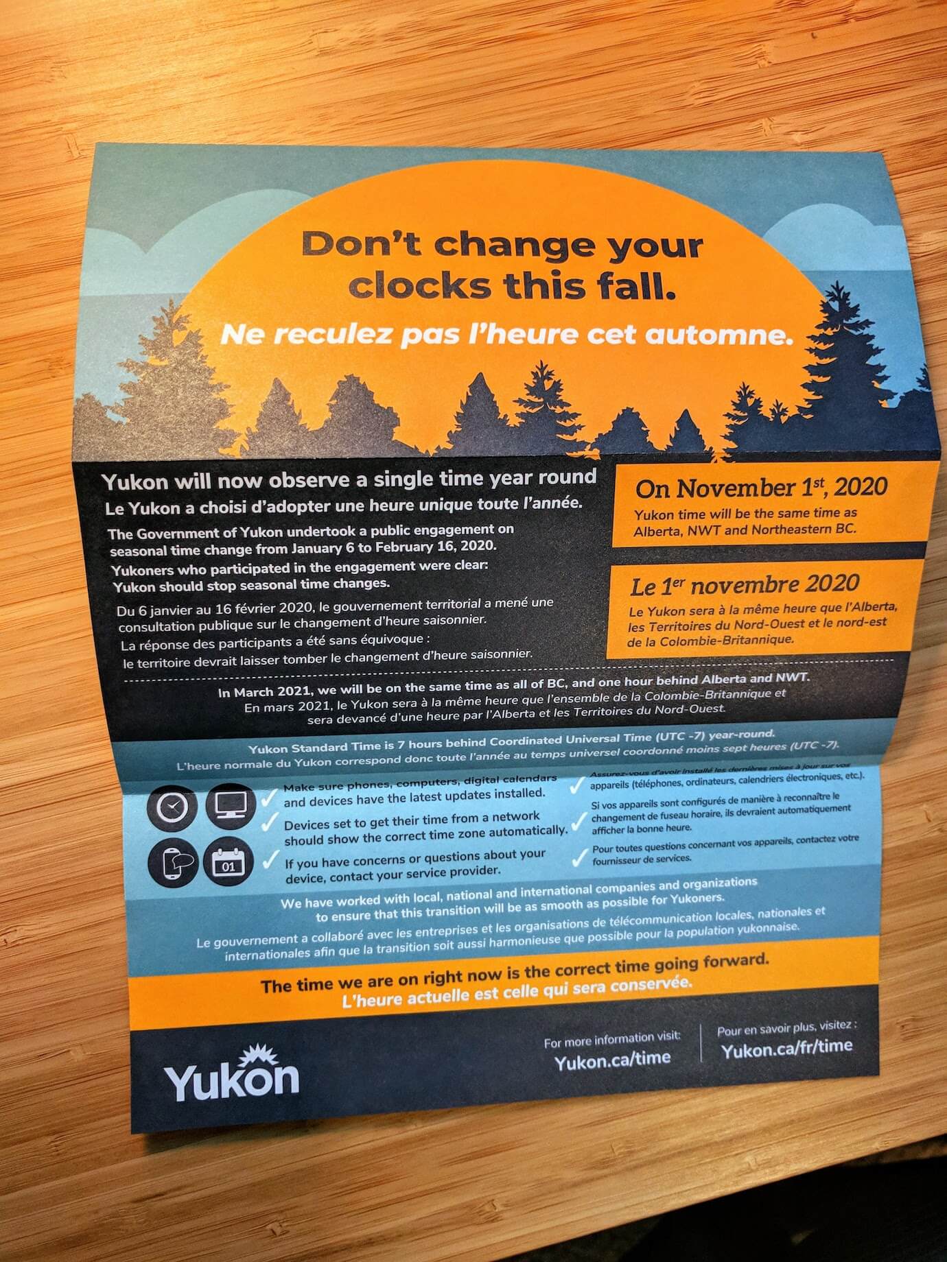 A flyer left in mailboxes by the Yukon government, saying: “Don’t change your clocks this fall. Ne reculez pas l’heure cet automne.” with reminders that Yukon will now observe a single time year round.