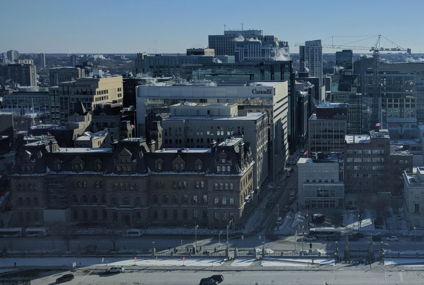 A view of the Office of the Prime Minister and Privy Council (formerly Langevin Block) and nearby buildings, taken from the Peace Tower on Parliament Hill in early 2019.